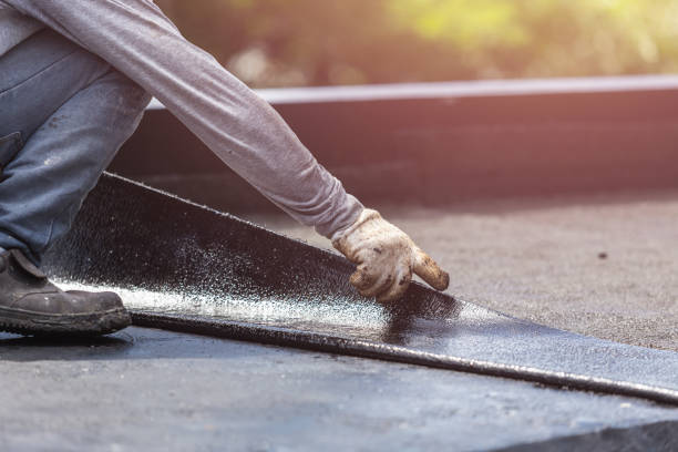 Professional Exterior Waterproofing technician working in Potomac, MD